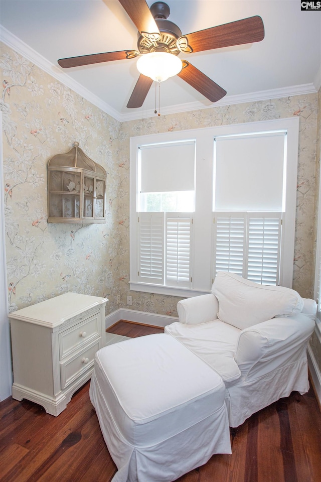 bedroom with crown molding, dark wood-type flooring, and ceiling fan