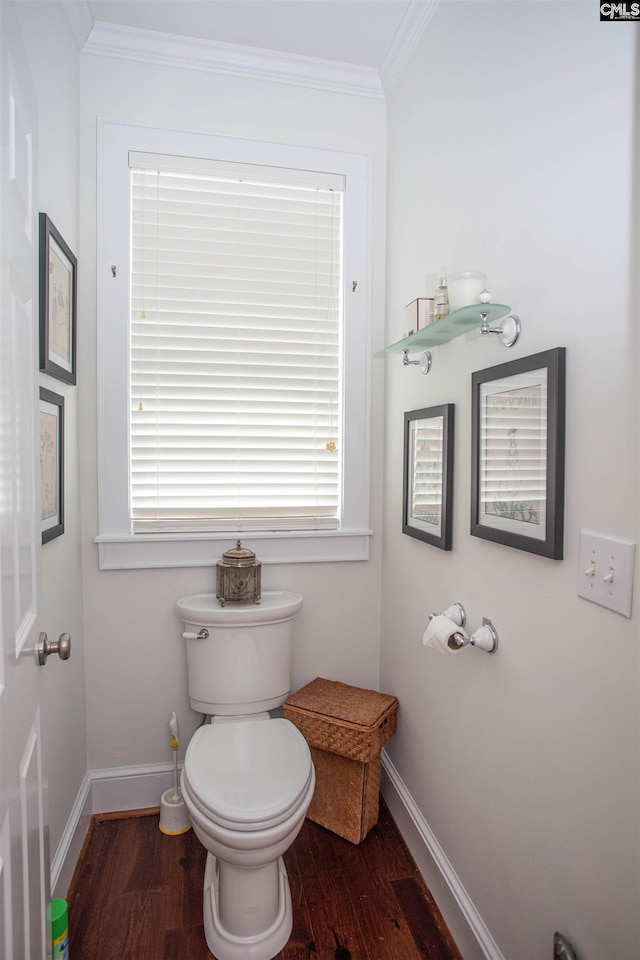 bathroom featuring hardwood / wood-style flooring, toilet, and plenty of natural light