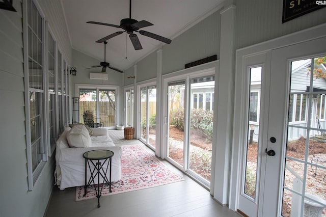 sunroom featuring a wealth of natural light, vaulted ceiling, and ceiling fan