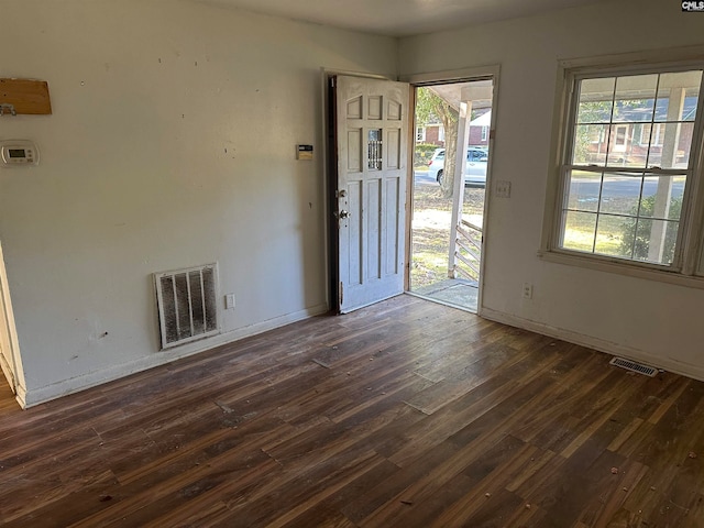 interior space with dark wood-type flooring