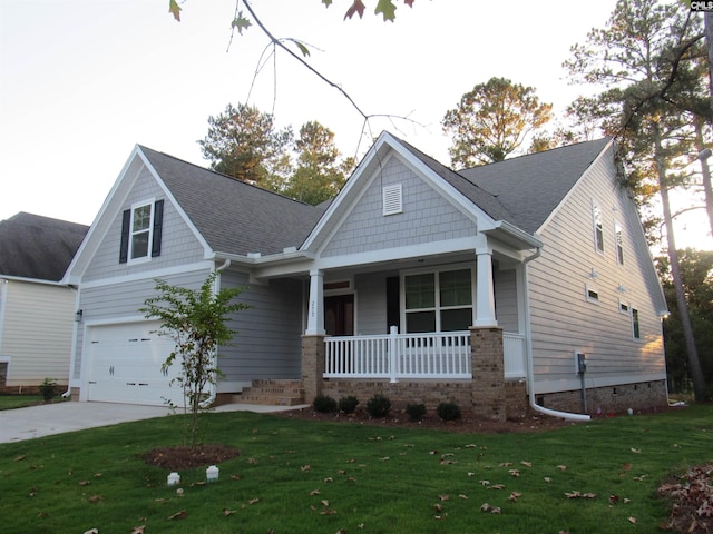 craftsman house with a porch and a front yard