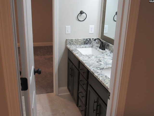 bathroom featuring vanity and tile patterned floors