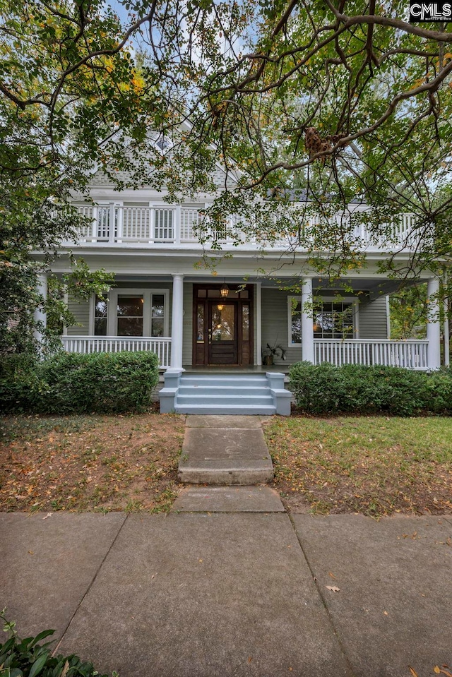 view of front of home featuring covered porch