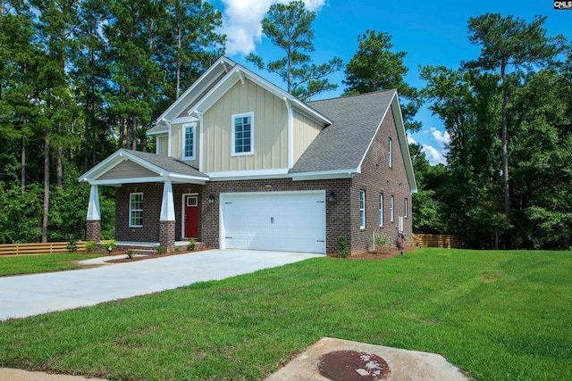 craftsman inspired home with a front lawn and a garage