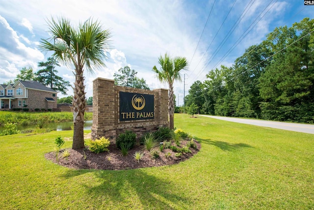 community sign with a yard