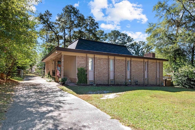 exterior space with a lawn