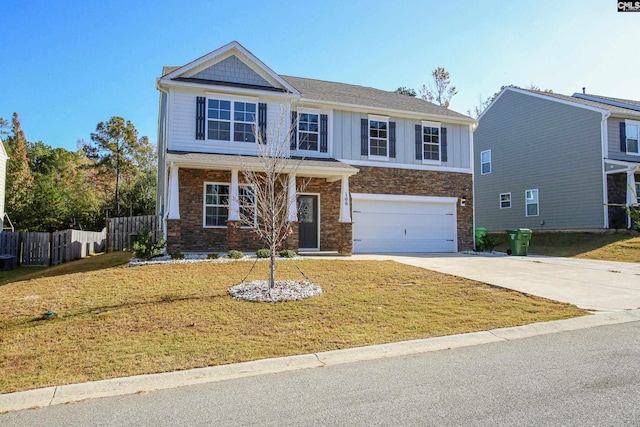 view of front facade featuring a front lawn and a garage