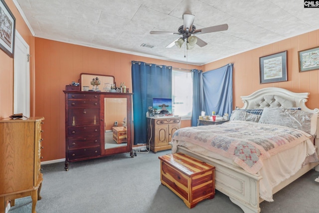 bedroom with ceiling fan and light carpet