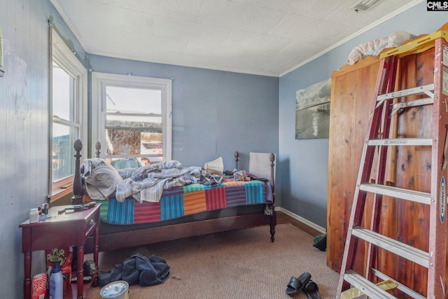 bedroom featuring ornamental molding, carpet floors, and wooden walls