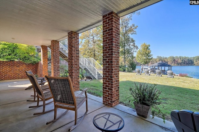 view of patio / terrace featuring a water view