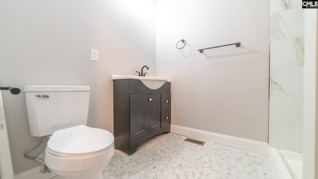 101 Dinkins Place Rd, Blythewood, SC 29130 - bathroom with toilet, a shower, vanity, and baseboards