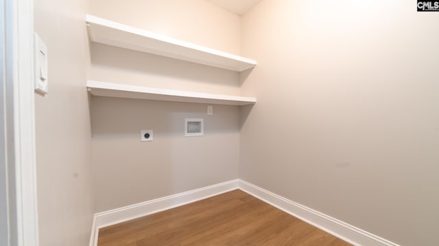 laundry area featuring hardwood / wood-style floors, hookup for an electric dryer, and hookup for a washing machine