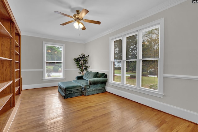 2001 Riding Ridge Rd, Columbia, SC 29223 - living area with wood finished floors, a ceiling fan, crown molding, and baseboards