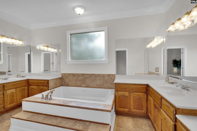 bathroom featuring vanity, ornamental molding, tile patterned floors, and a washtub