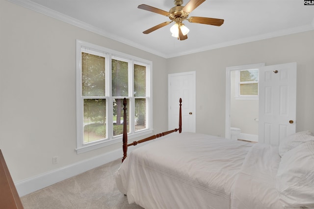 bedroom featuring multiple windows, light colored carpet, crown molding, and ceiling fan