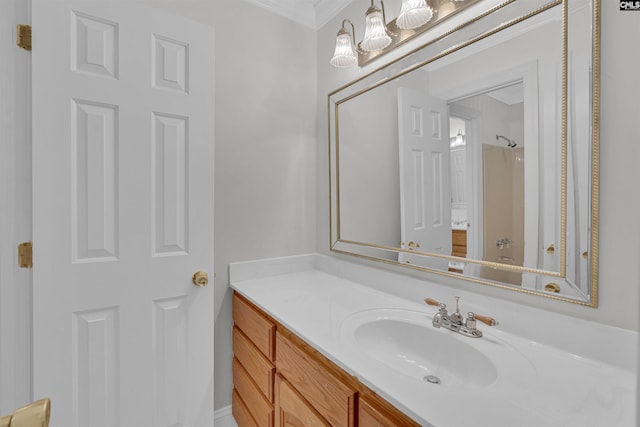 bathroom featuring vanity and ornamental molding