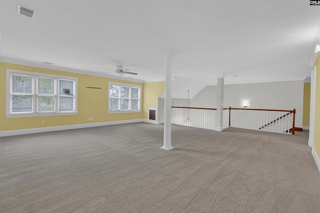 2001 Riding Ridge Rd, Columbia, SC 29223 - unfurnished room with a ceiling fan, carpet floors, baseboards, decorative columns, and crown molding