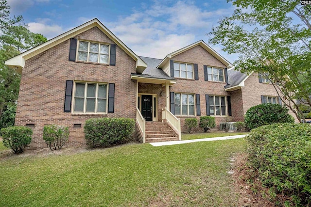 2001 Riding Ridge Rd, Columbia, SC 29223 - view of front facade with brick siding and a front yard