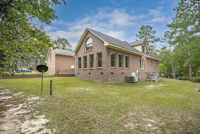 2001 Riding Ridge Rd, Columbia, SC 29223 - view of property exterior with crawl space, central AC, a yard, and brick siding
