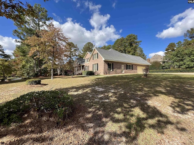 2001 Riding Ridge Rd, Columbia, SC 29223 - view of home's exterior with a yard and brick siding