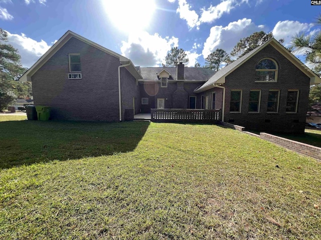 2001 Riding Ridge Rd, Columbia, SC 29223 - back of property with a lawn, brick siding, and a chimney