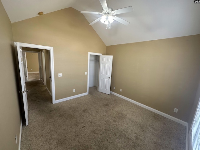 unfurnished bedroom with ceiling fan, high vaulted ceiling, and carpet flooring