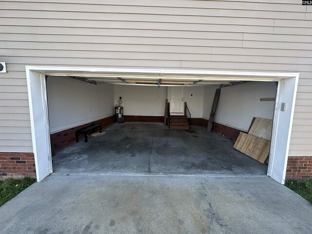 garage featuring electric water heater