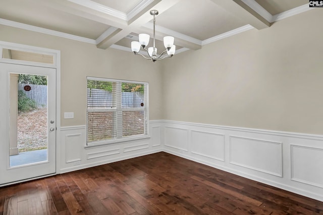 unfurnished dining area featuring beam ceiling, a wealth of natural light, and dark hardwood / wood-style flooring