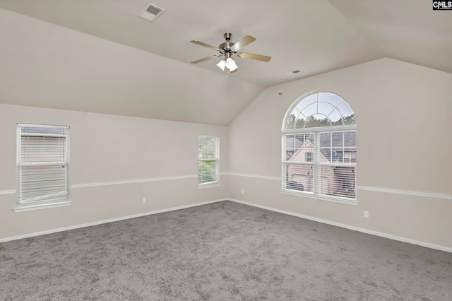 additional living space with lofted ceiling, carpet, and ceiling fan