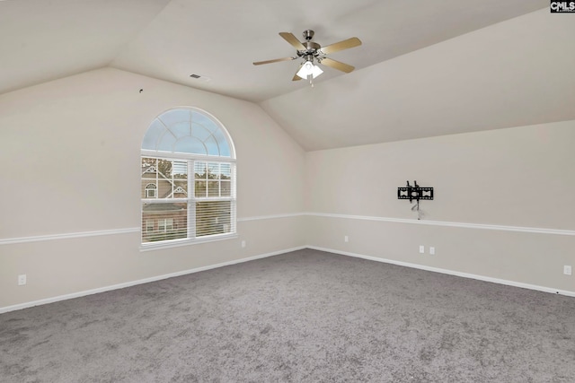 additional living space with ceiling fan, vaulted ceiling, and carpet floors