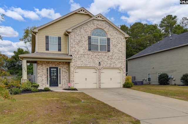 view of front facade featuring a front yard and a garage