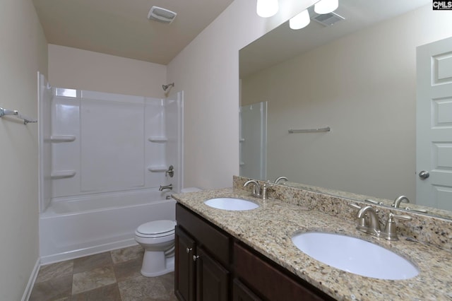 full bathroom featuring vanity, toilet, and bathtub / shower combination