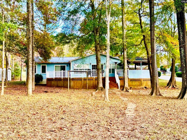 view of front of property with a deck