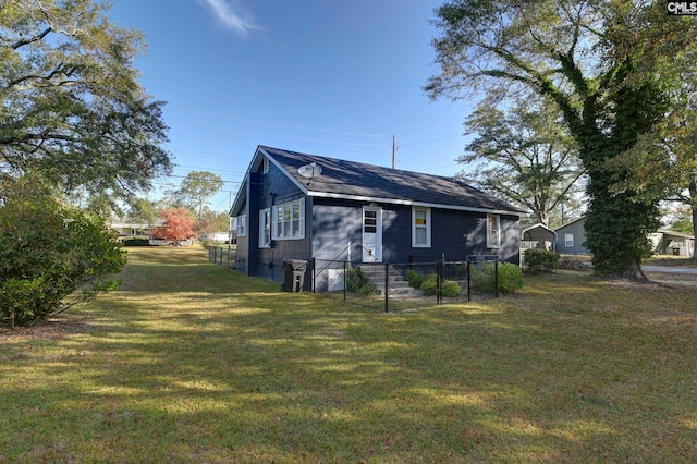 bungalow with a front yard