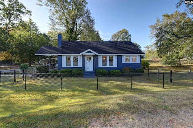 ranch-style home with a front lawn