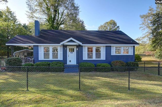 single story home featuring a front yard