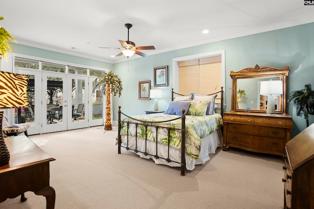 carpeted bedroom featuring access to outside, french doors, crown molding, and ceiling fan