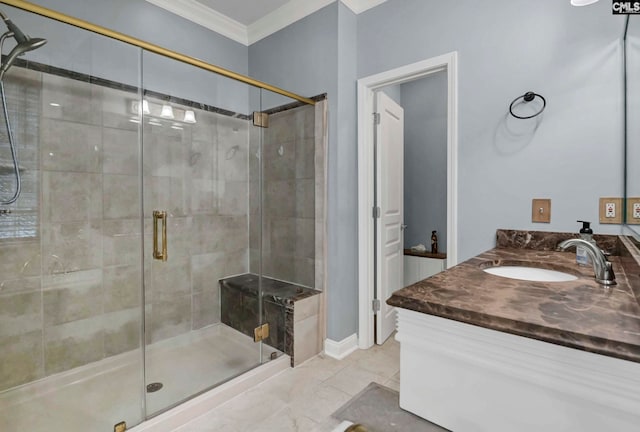 bathroom with vanity, crown molding, and walk in shower