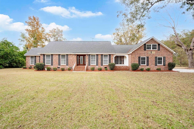 ranch-style home with a front yard