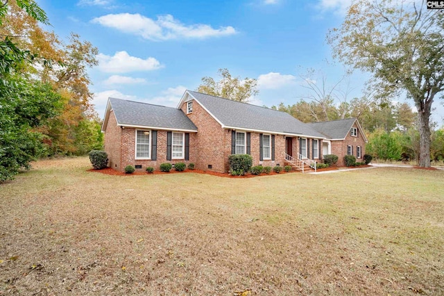 single story home featuring a front yard