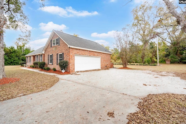 view of property exterior featuring a garage