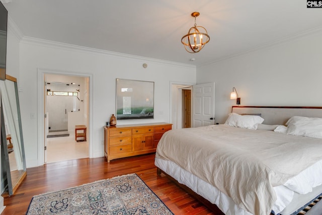 bedroom with crown molding, connected bathroom, dark hardwood / wood-style floors, and a chandelier