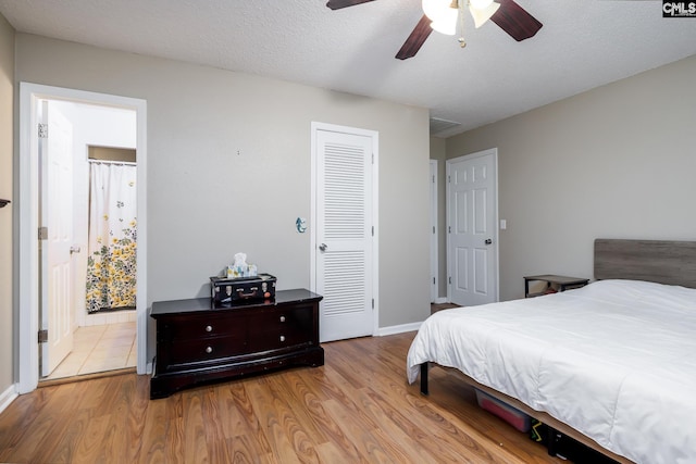 401 Nottingham Rd, Columbia, SC 29210 - bedroom featuring a closet, a ceiling fan, baseboards, and wood finished floors