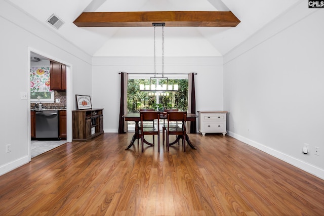401 Nottingham Rd, Columbia, SC 29210 - living area featuring wood finished floors, baseboards, and lofted ceiling