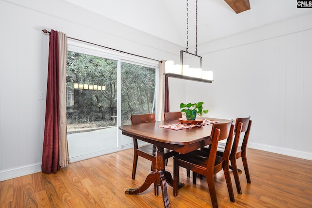 dining area with hardwood / wood-style flooring