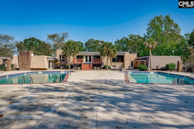 view of pool with a patio area