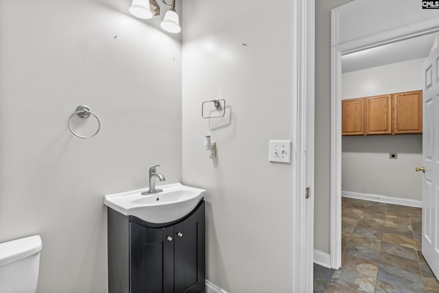 420 Indigo Ridge Dr, Columbia, SC 29229 - bathroom featuring vanity, baseboards, toilet, and stone finish flooring