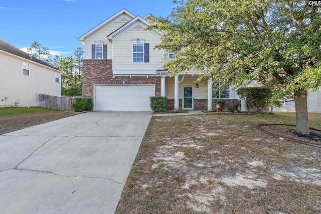 view of front of property with a garage