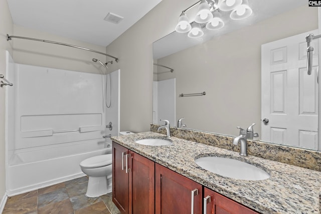 full bathroom featuring vanity, shower / tub combination, and toilet