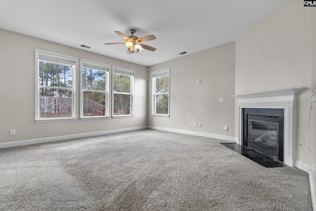 420 Indigo Ridge Dr, Columbia, SC 29229 - unfurnished living room featuring a ceiling fan, visible vents, a fireplace with flush hearth, baseboards, and carpet flooring